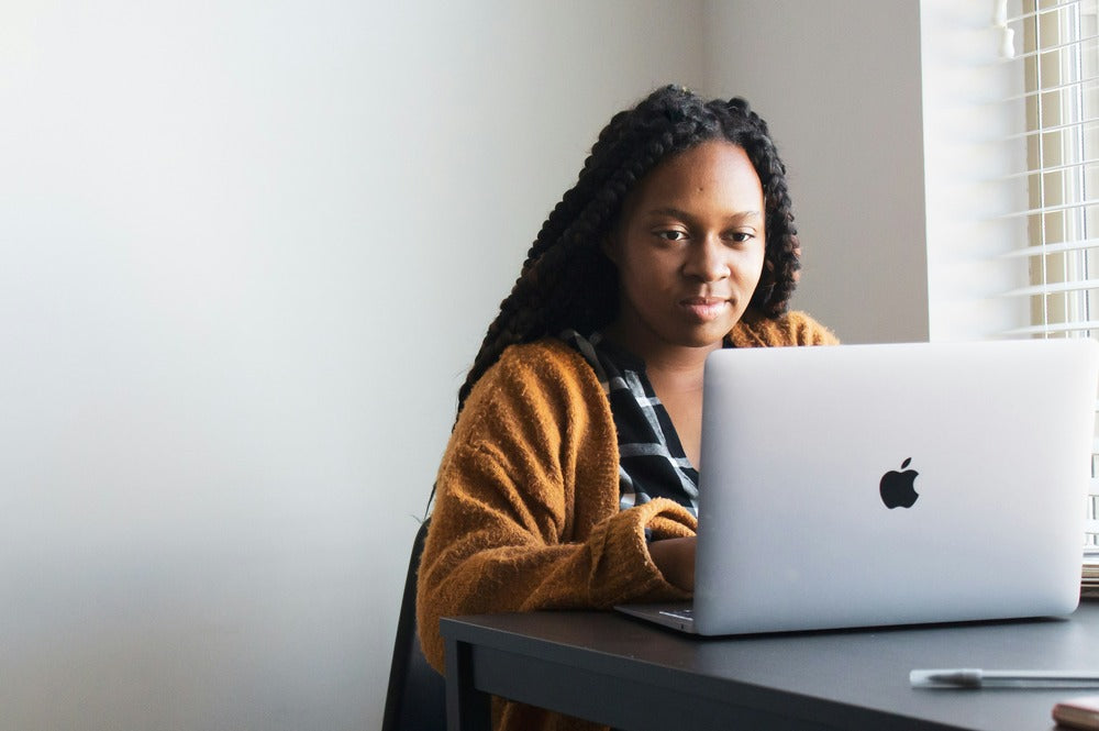 A lady freelancer working on her laptop